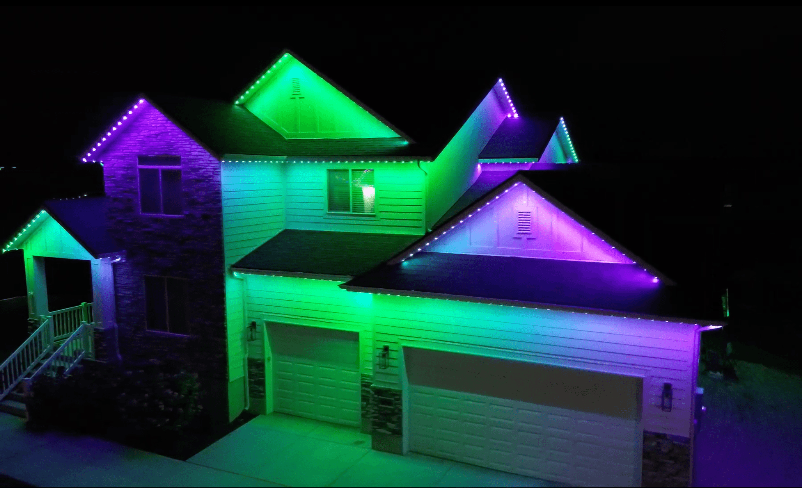 Permanent holiday lighting displaying orange and purple for Halloween